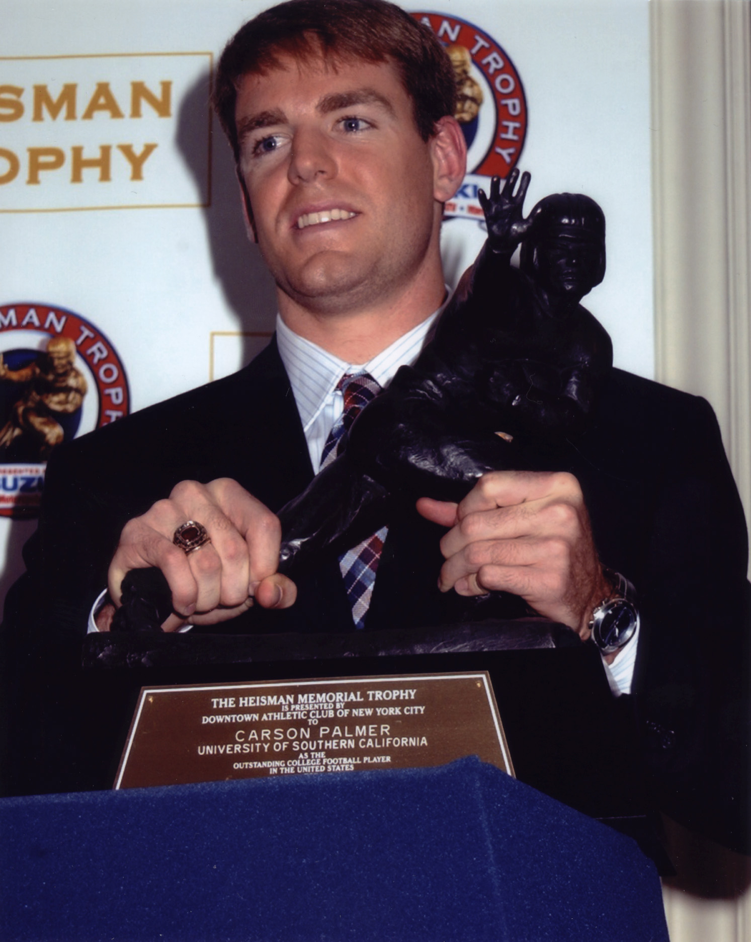 Carson Palmer with Heisman Trophy Award