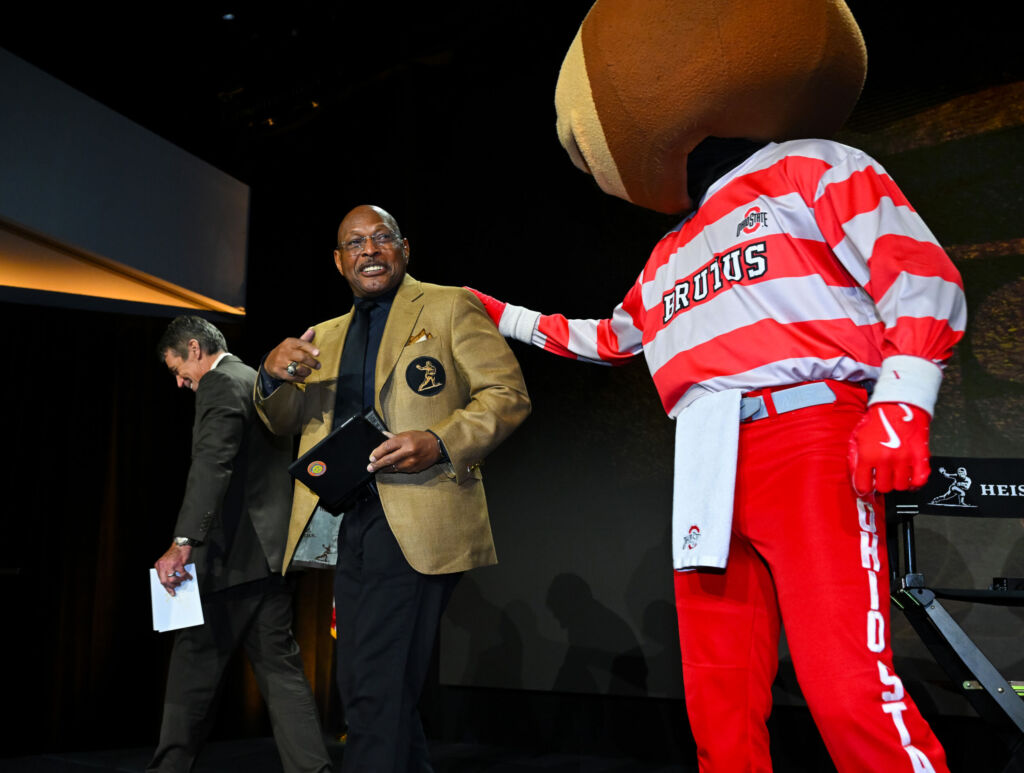 Ohio State's Brutus Buckeye with Archie Griffin at the Heisman Legends Brunch.
