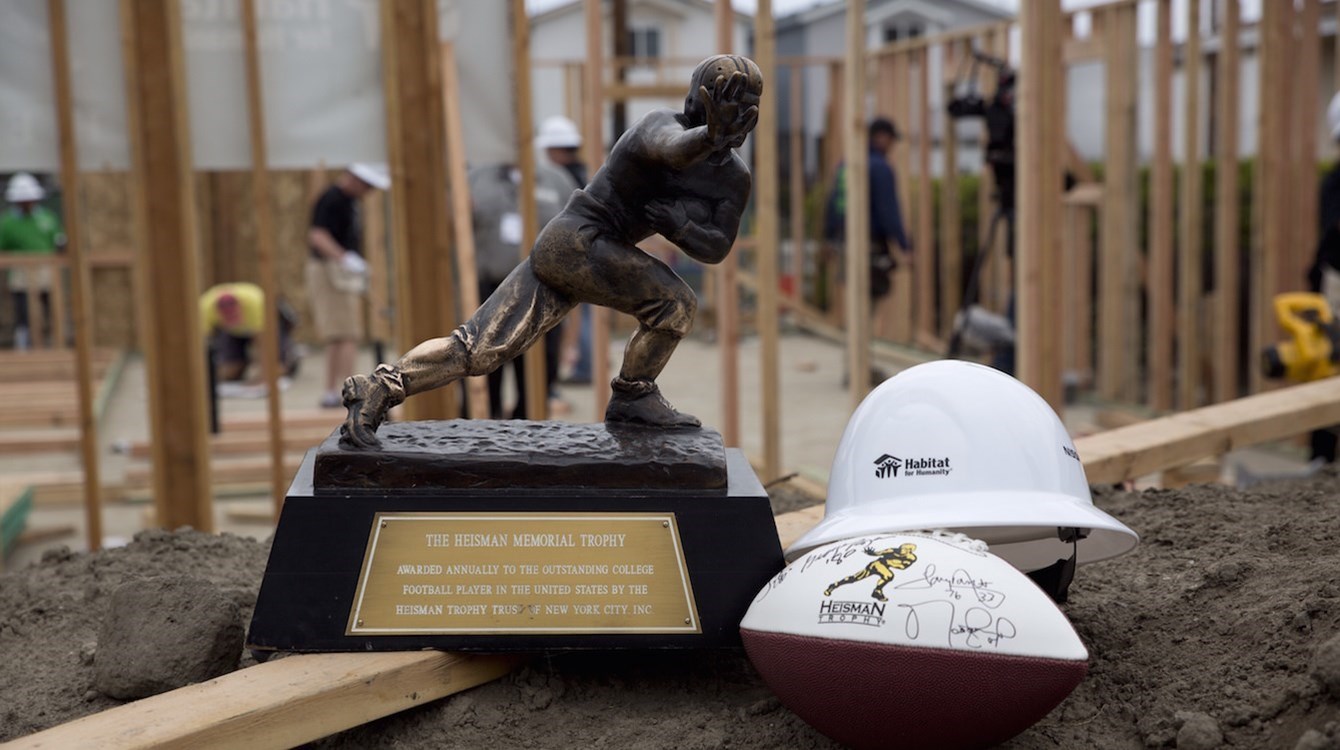 Heisman winners team up with Habitat for Humanity